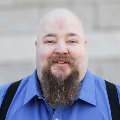 Headshot portrait image of John Jelenic